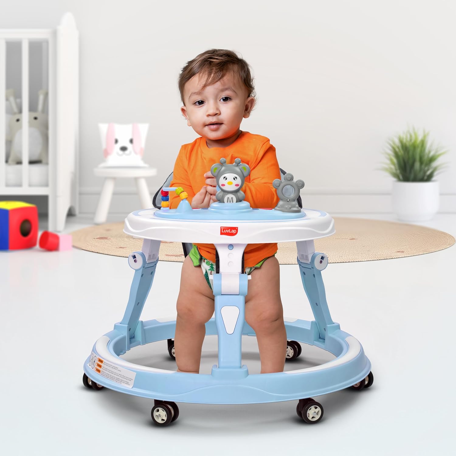 Usmile Toys LuvLap 360° Joy baby walker in orange, offering stable support and engaging playtime for toddlers. www.usmile.toys